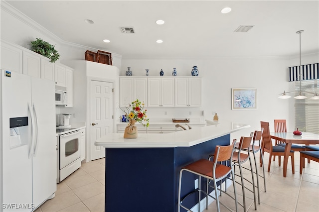 kitchen with white cabinetry, pendant lighting, white appliances, and ornamental molding