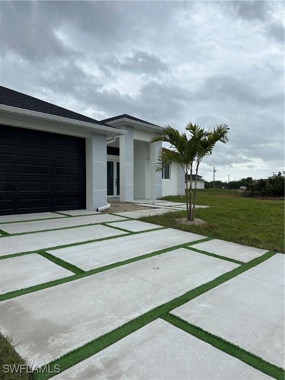 exterior space with a garage