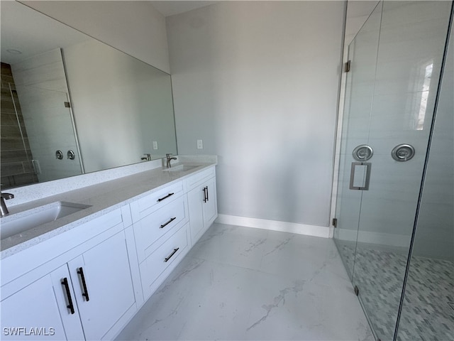 bathroom with a shower with door and vanity