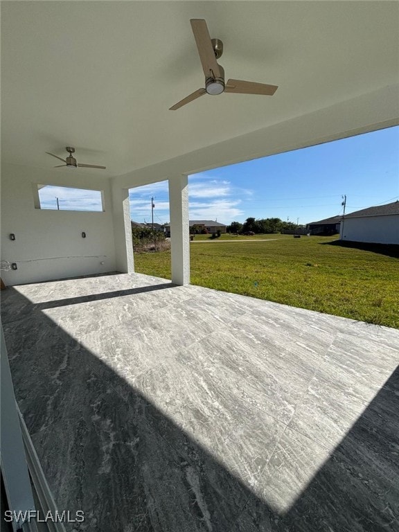 view of patio / terrace featuring ceiling fan