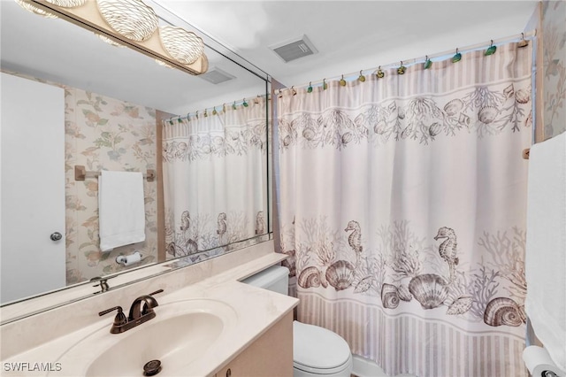 full bathroom featuring vanity, toilet, visible vents, wallpapered walls, and a shower with shower curtain