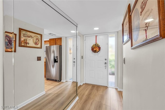 entrance foyer featuring light wood-type flooring