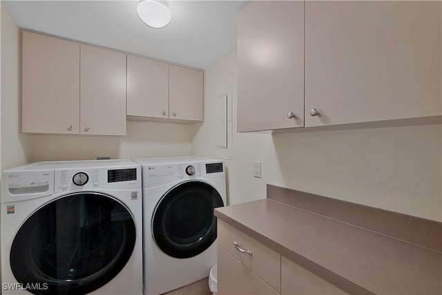 104 Wilderness Dr Unit 341, Naples, FL 34105 - clothes washing area with independent washer and dryer and cabinet space