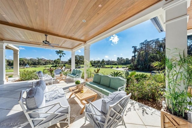 104 Wilderness Dr Unit 341, Naples, FL 34105 - view of patio / terrace with outdoor lounge area, a ceiling fan, and view of golf course