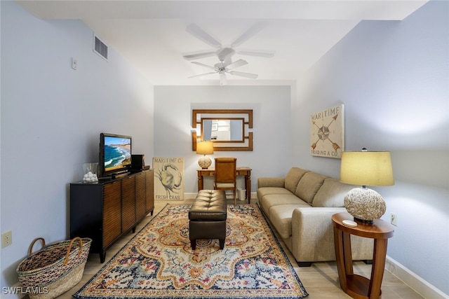 living room with ceiling fan