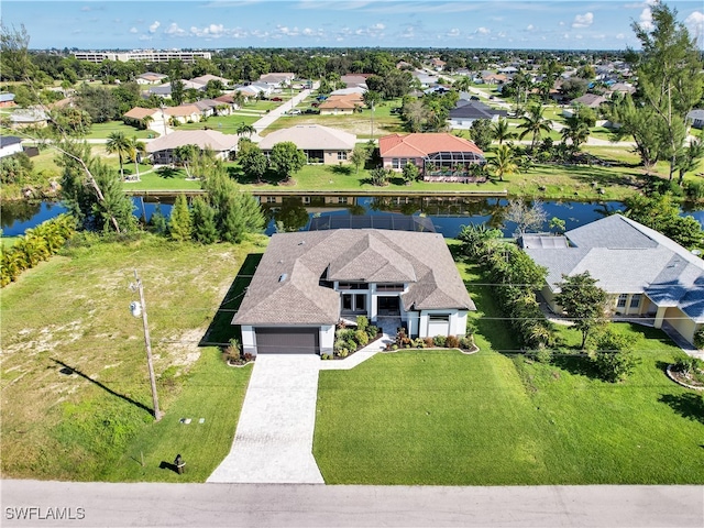 drone / aerial view with a water view