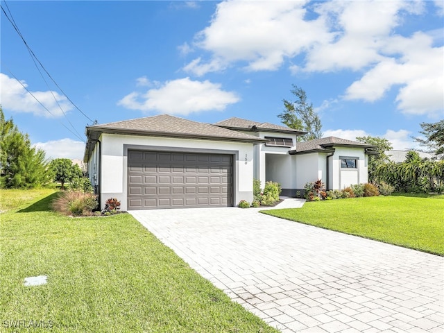 view of front facade with a front lawn and a garage