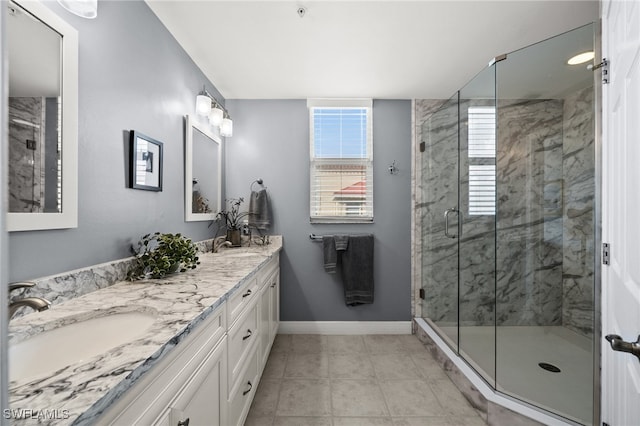 bathroom featuring vanity and walk in shower