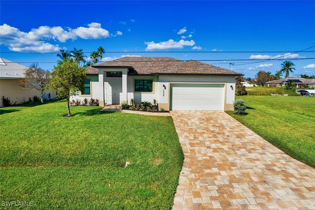 view of front facade featuring a front yard and a garage