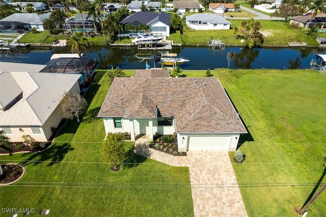 bird's eye view with a water view