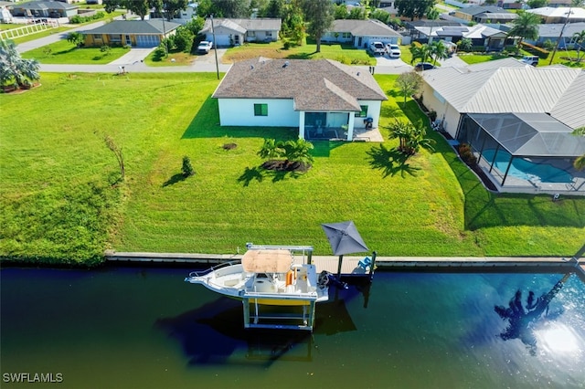 drone / aerial view with a water view