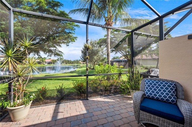 sunroom with a water view