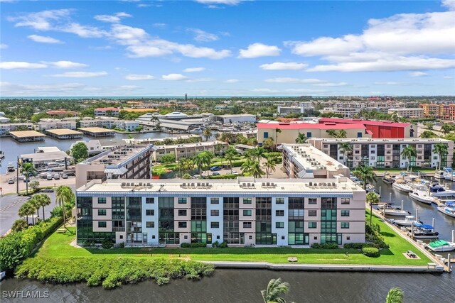 bird's eye view with a water view