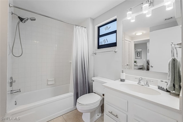 full bathroom featuring shower / bath combination with curtain, vanity, toilet, and tile patterned floors