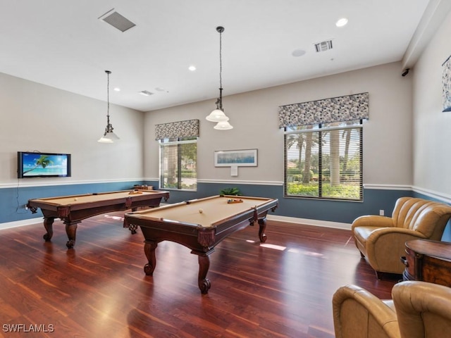 game room featuring dark wood-type flooring, pool table, and a healthy amount of sunlight