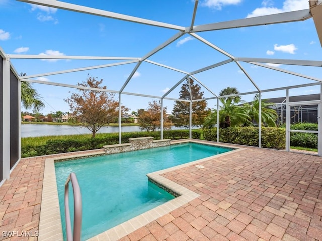 view of swimming pool featuring a water view, a patio, and glass enclosure