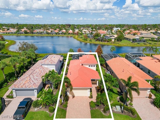 bird's eye view with a water view