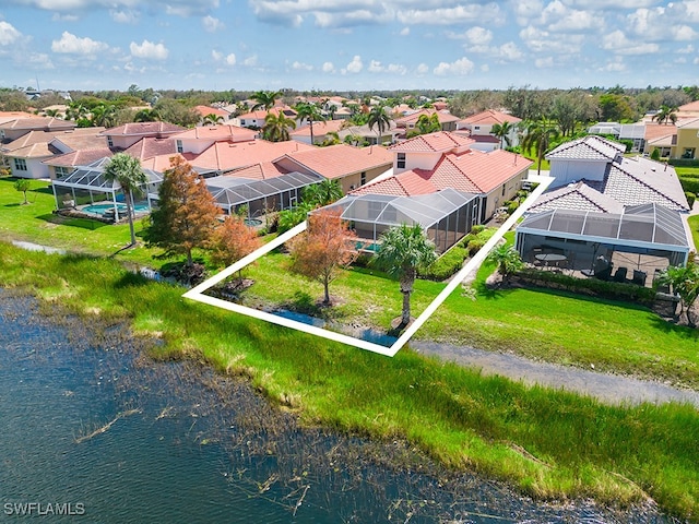 aerial view featuring a water view