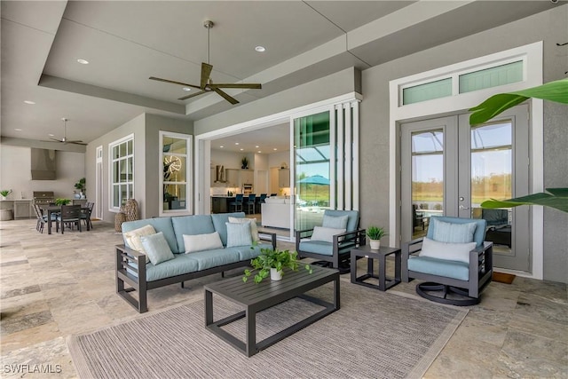 view of patio / terrace featuring an outdoor living space and ceiling fan