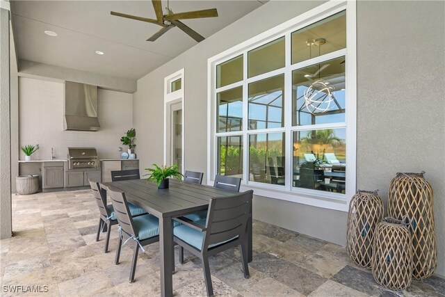 view of patio / terrace featuring a grill, ceiling fan, sink, and area for grilling