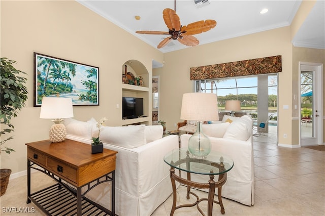 tiled living room featuring ceiling fan and crown molding