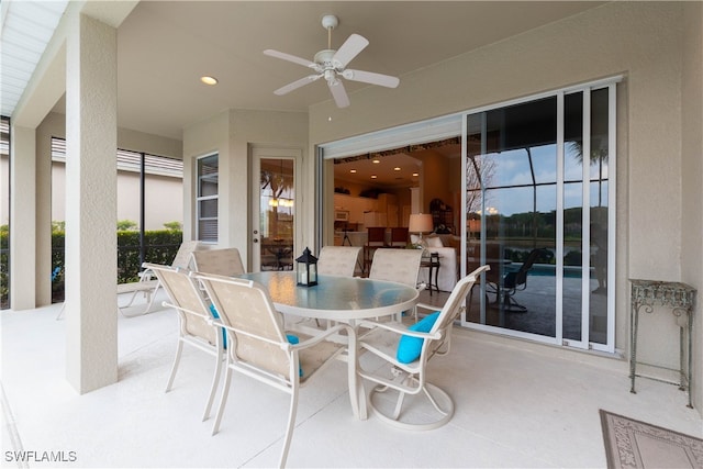 view of patio with ceiling fan