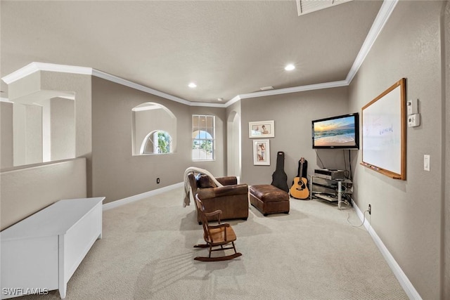 sitting room featuring crown molding, recessed lighting, visible vents, carpet flooring, and baseboards