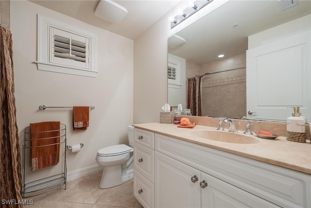 bathroom with walk in shower, vanity, tile patterned flooring, and toilet