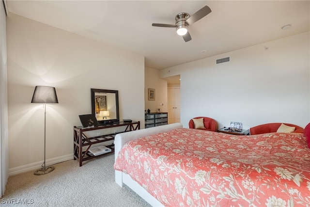 bedroom with ceiling fan and carpet floors