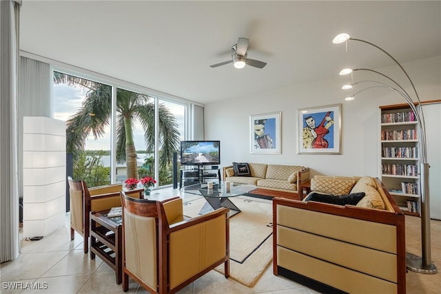 tiled living room featuring ceiling fan