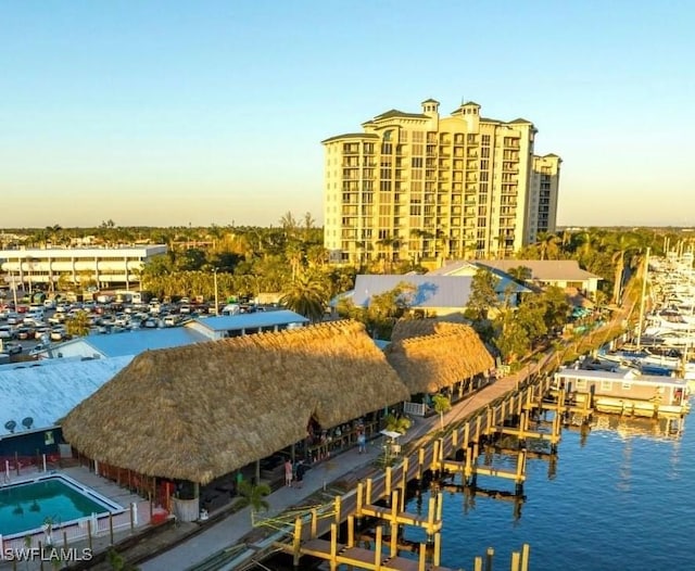 aerial view at dusk with a water view