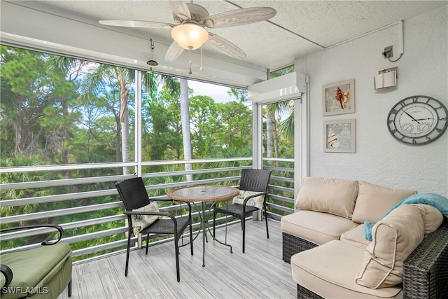 sunroom / solarium with ceiling fan