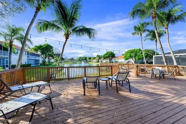 deck featuring a water view