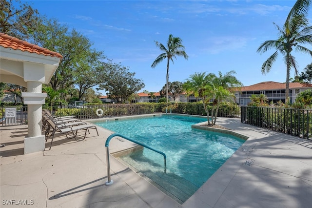 view of swimming pool featuring a patio