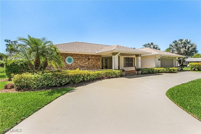 view of front of home with a garage