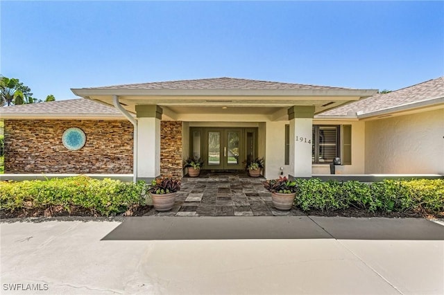 entrance to property featuring french doors