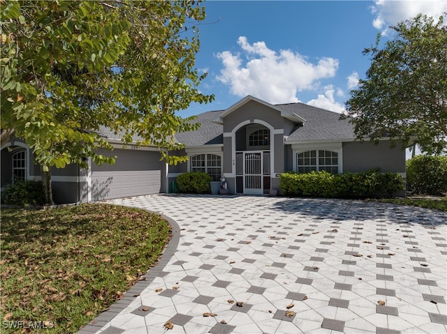 single story home with a garage