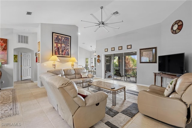 living room with light tile patterned flooring, high vaulted ceiling, and ceiling fan