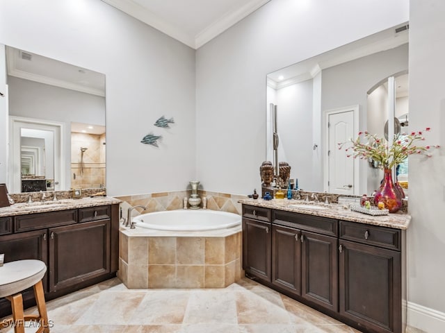 bathroom with vanity, crown molding, and plus walk in shower