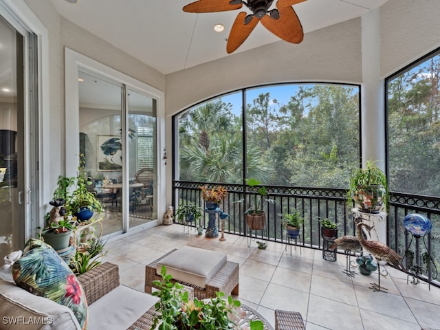 sunroom / solarium with ceiling fan