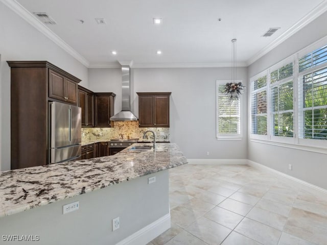 28520 Calabria Ct Unit 201, Naples, FL 34110 - kitchen with a sink, light stone countertops, stainless steel fridge, wall chimney range hood, and decorative backsplash
