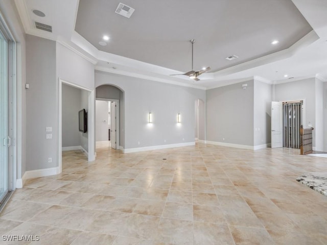 28520 Calabria Ct Unit 201, Naples, FL 34110 - unfurnished room with a raised ceiling, arched walkways, and visible vents