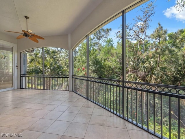 28520 Calabria Ct Unit 201, Naples, FL 34110 - unfurnished sunroom with ceiling fan