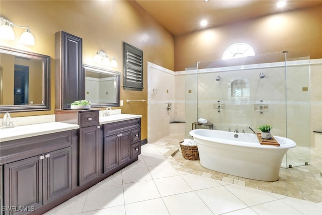 bathroom with vanity, separate shower and tub, and tile patterned flooring