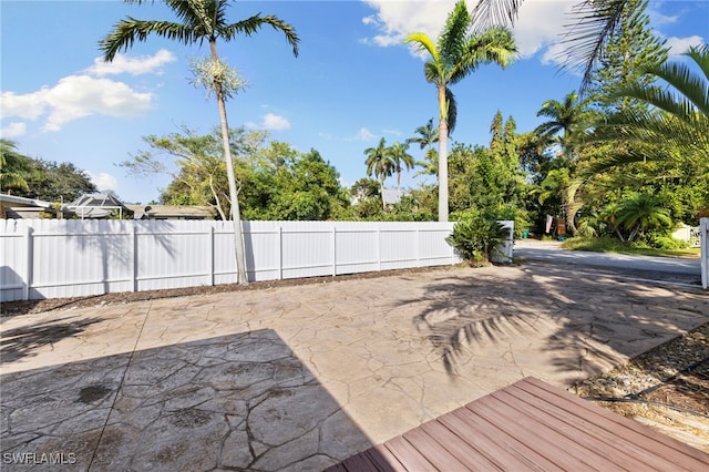 1235 Rordon Ave, Naples, FL 34103 - view of yard with a patio and fence