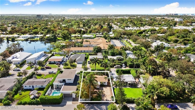 1235 Rordon Ave, Naples, FL 34103 - aerial perspective of suburban area featuring property boundaries highlighted and a nearby body of water