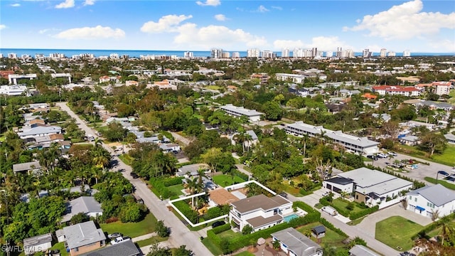 drone / aerial view featuring a water view