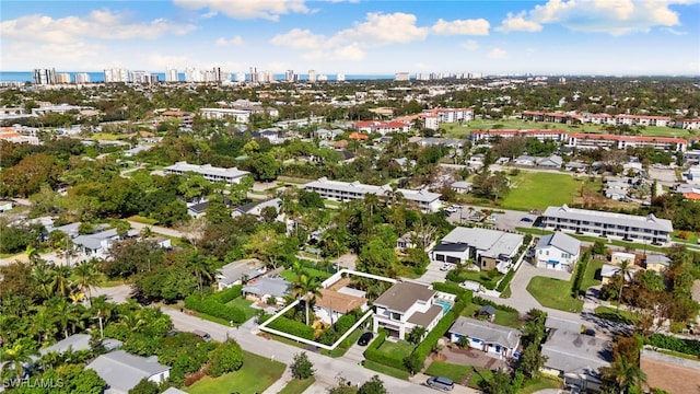 1235 Rordon Ave, Naples, FL 34103 - aerial view of property and surrounding area with nearby urban area
