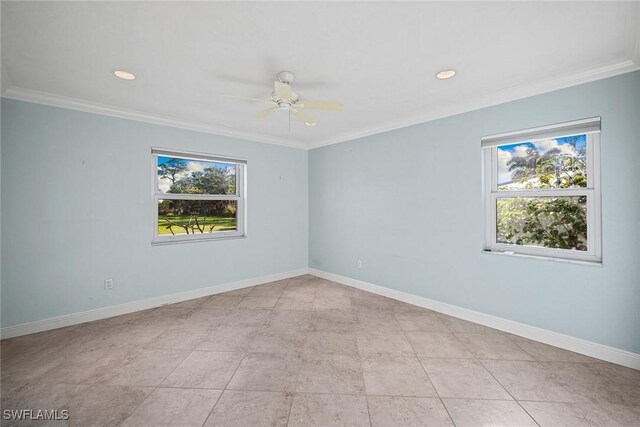 tiled spare room with crown molding and ceiling fan