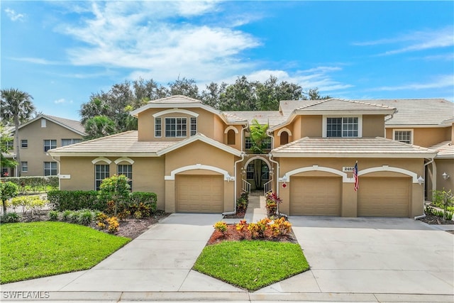 view of front of property featuring a garage